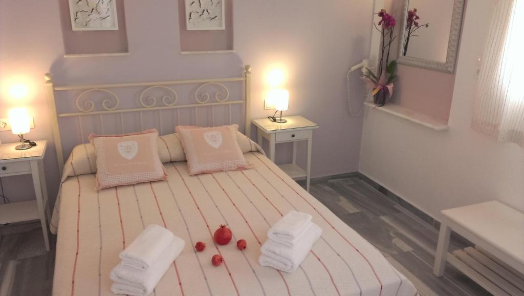 Postel nebo postele na pokoji v ubytování Hotel Cyclades