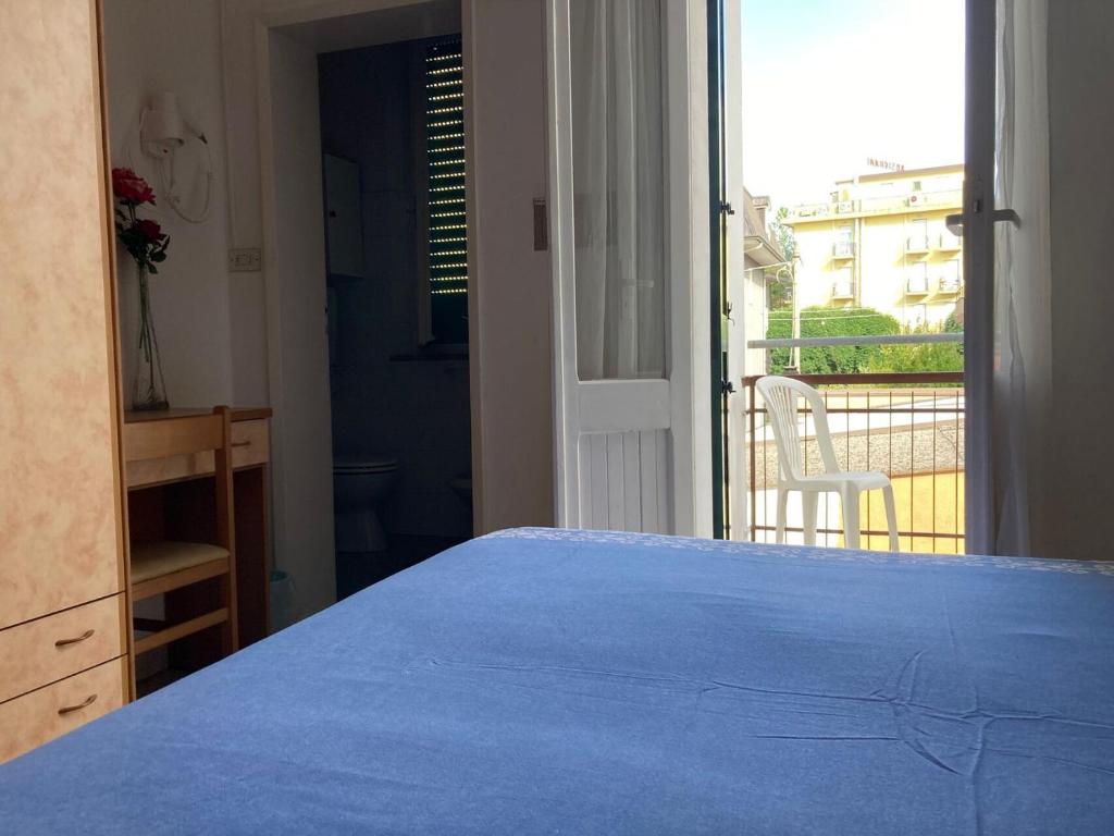 Postel nebo postele na pokoji v ubytování Hotel Villa Sorci