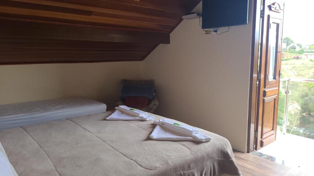 Postel nebo postele na pokoji v ubytování Recanto Lua Clara