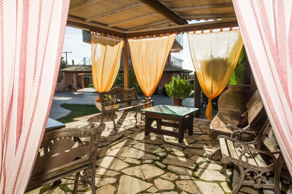 A balcony or terrace at Cozy flats in an olive grove by the sandy beach