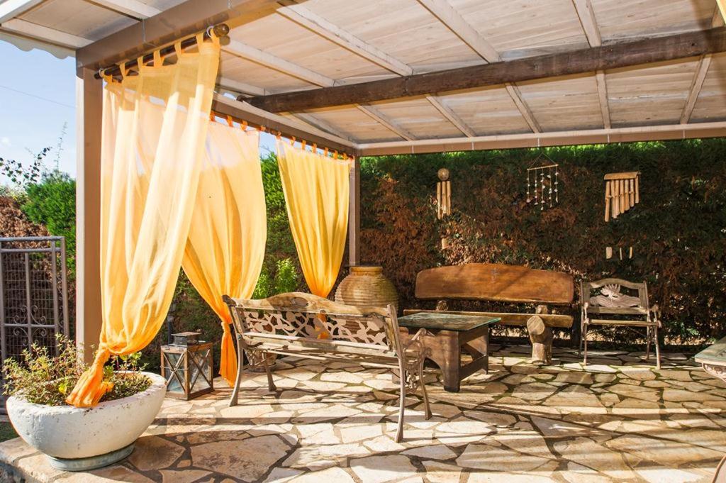 A patio or other outdoor area at Cozy flats in an olive grove by the sandy beach