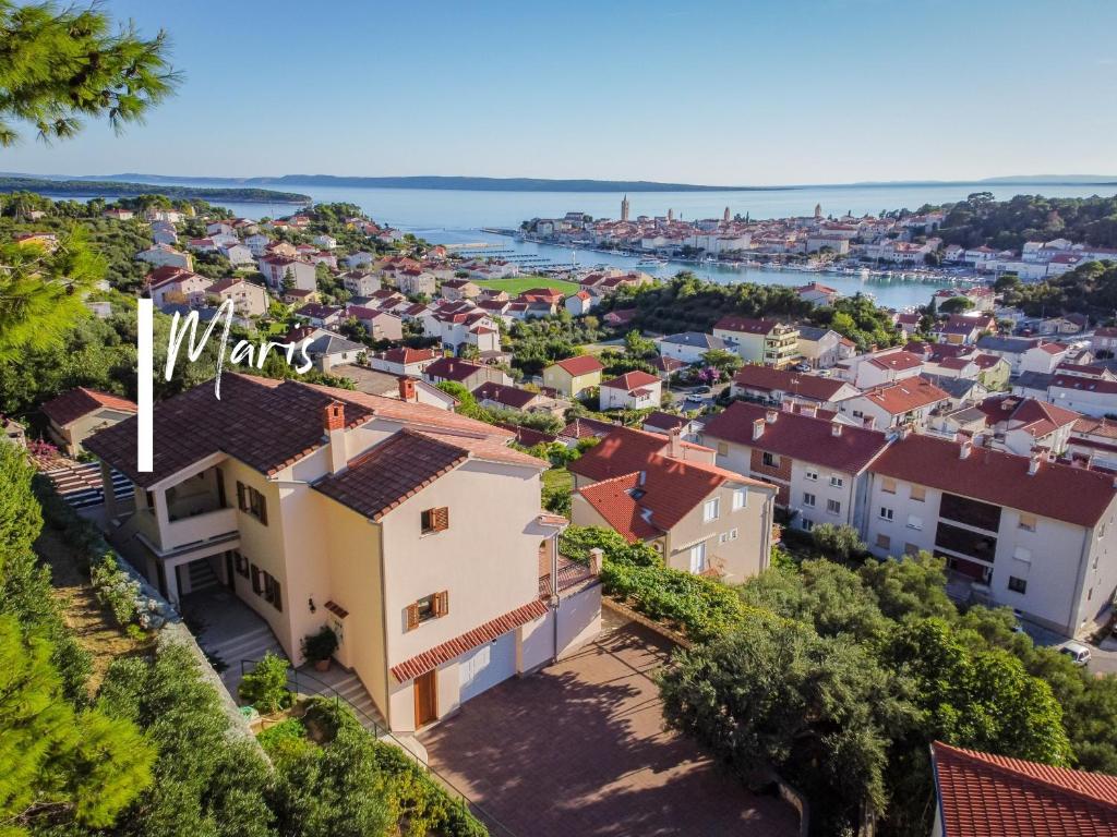 an aerial view of a city with houses at Maris in Rab