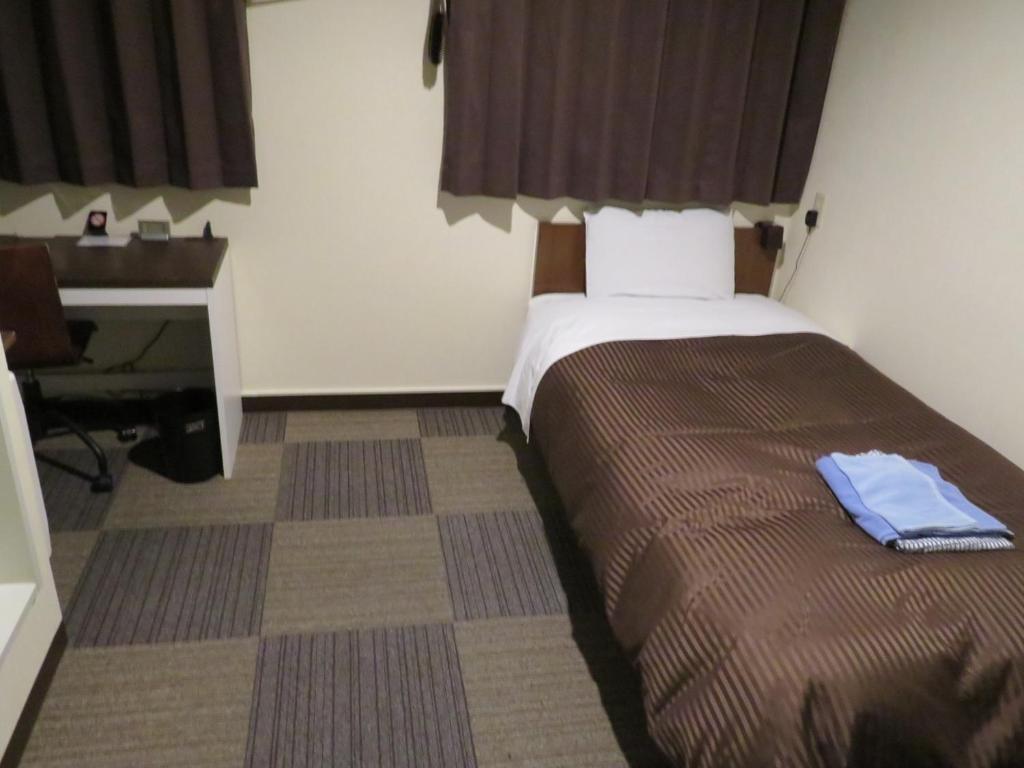 מיטה או מיטות בחדר ב-Hotel Marue - Vacation STAY 78769v