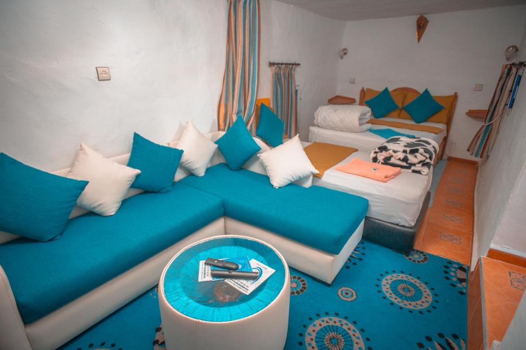 Una cama o camas en una habitación de Riad Antek