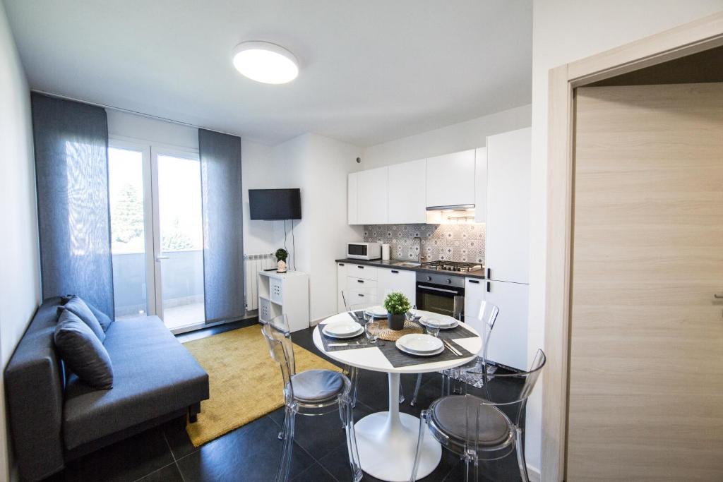 O bucătărie sau chicinetă la Il Puccino - Modern Apartment