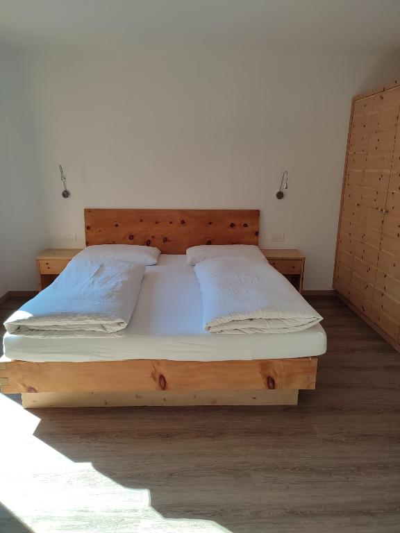 Postel nebo postele na pokoji v ubytování Apartments B&B Pretermo