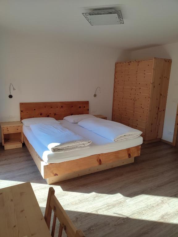 Postel nebo postele na pokoji v ubytování Apartments B&B Pretermo