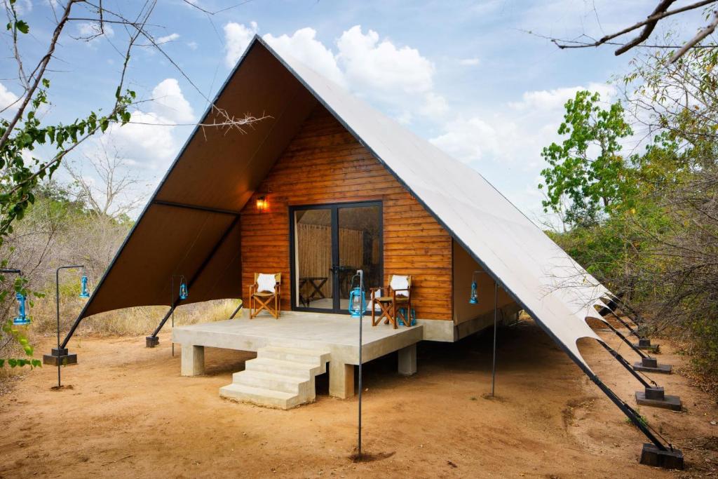 a small house with a triangular roof at Makini Bush Camp, Yala in Yala