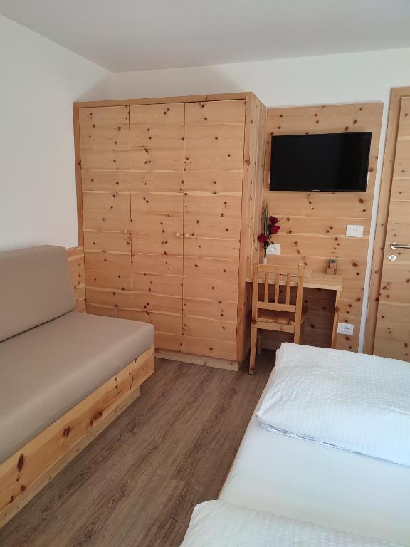 Postel nebo postele na pokoji v ubytování Apartments B&B Pretermo