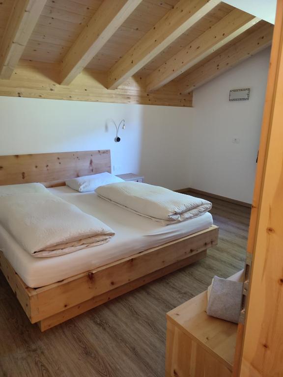 Postel nebo postele na pokoji v ubytování Apartments B&B Pretermo