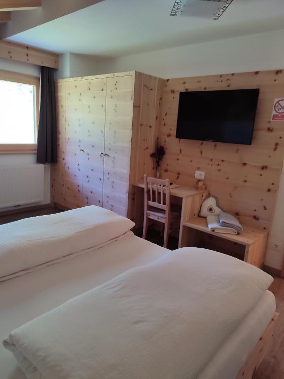 Postel nebo postele na pokoji v ubytování Apartments B&B Pretermo