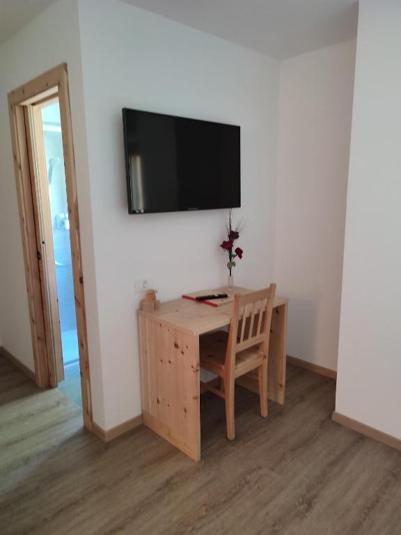 TV a/nebo společenská místnost v ubytování Apartments B&B Pretermo