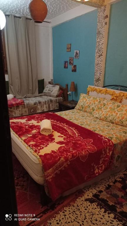 Postel nebo postele na pokoji v ubytování Maison d'hotes Ait Bou Izryane
