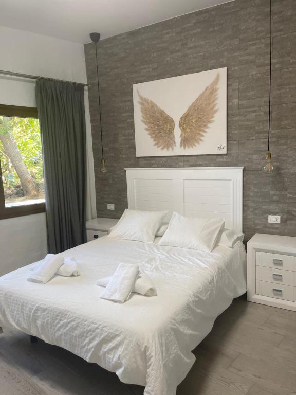 Postel nebo postele na pokoji v ubytování Apartamentos Finca Wapa