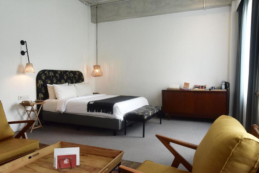 Voodi või voodid majutusasutuse Hotel Monopoli toas