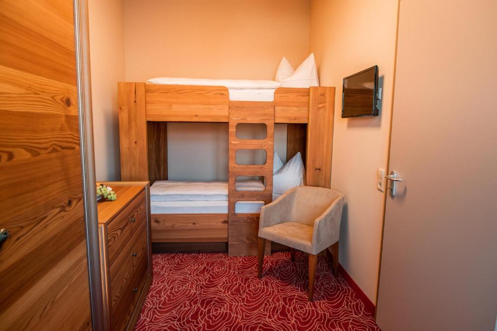 Postel nebo postele na pokoji v ubytování Hotel Freyhof