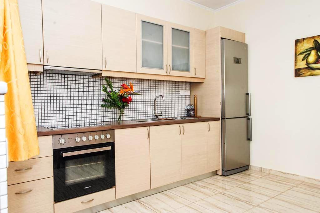 A kitchen or kitchenette at Cozy flats in an olive grove by the sandy beach
