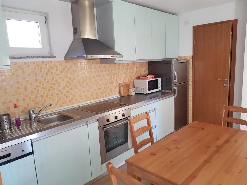 Kuchyň nebo kuchyňský kout v ubytování Minihaus in Zagreb
