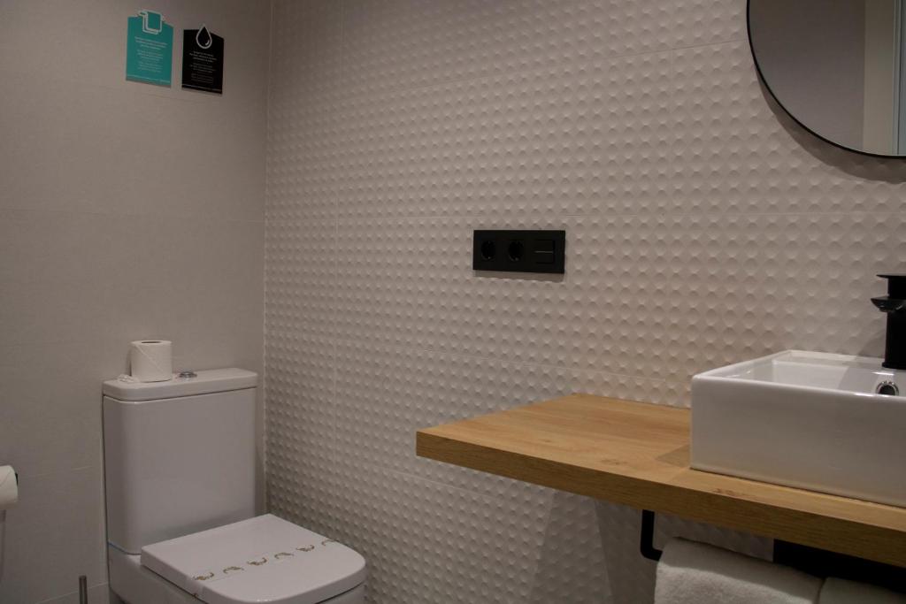 Koupelna v ubytování Hotel Alda Orzán