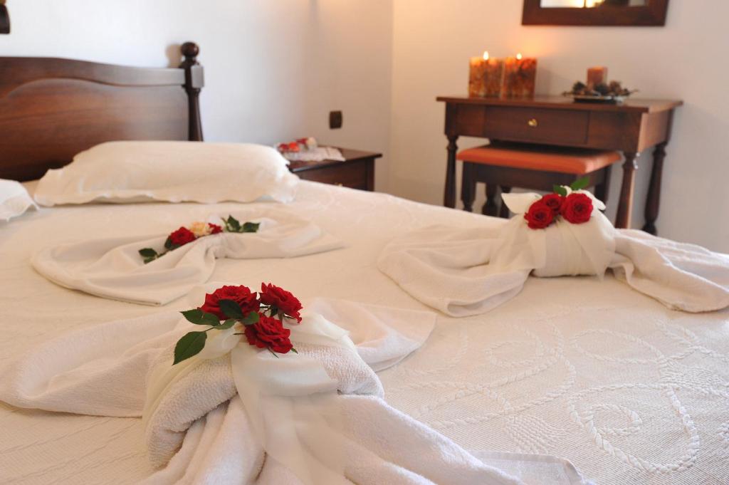 Postel nebo postele na pokoji v ubytování Kavousi Resort