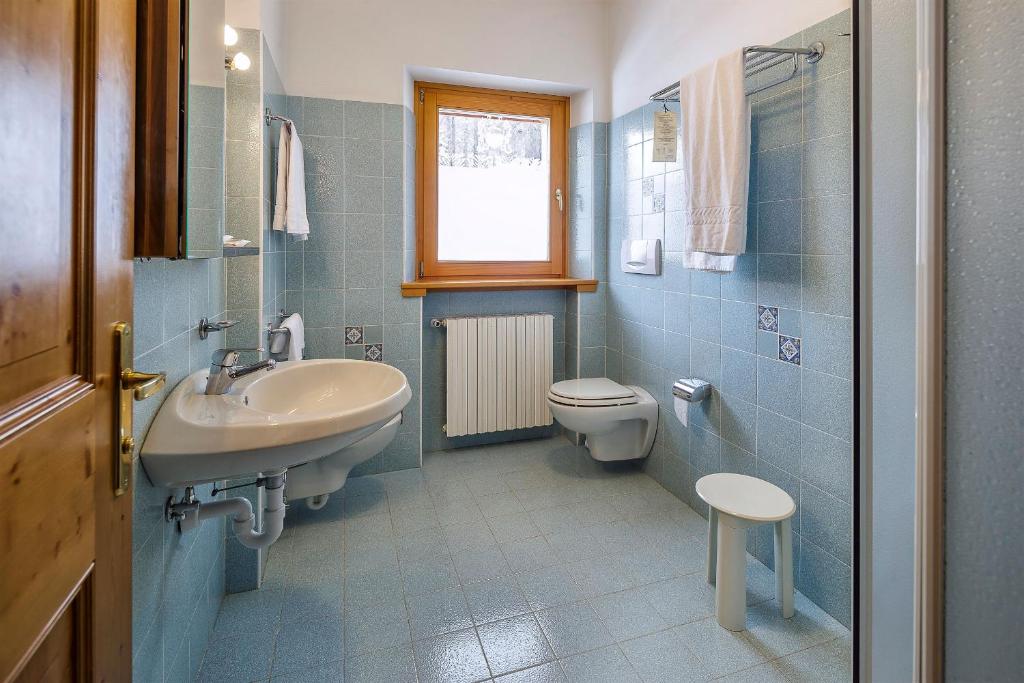 Ванная комната в Hotel Piccolo Pocol