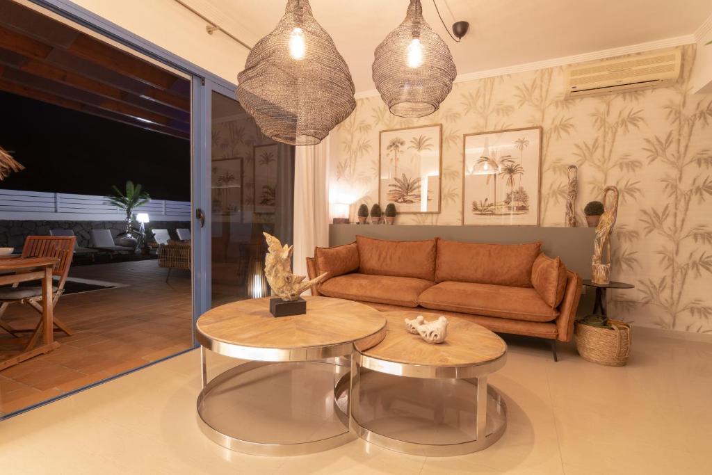 A seating area at Villa Arai by Villalia