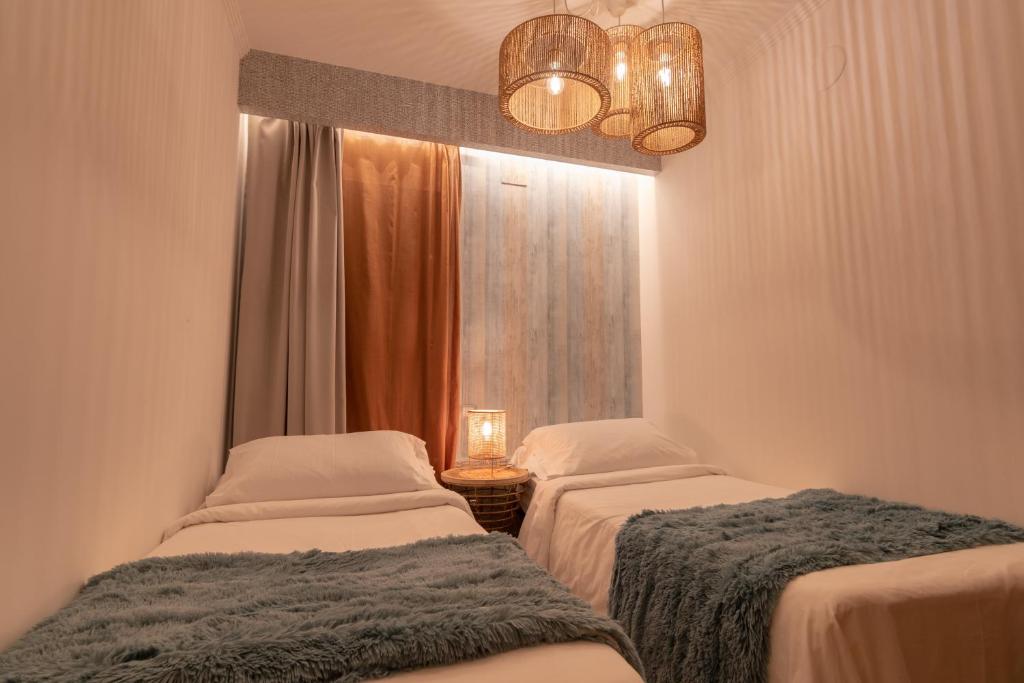 A bed or beds in a room at Villa Arai by Villalia