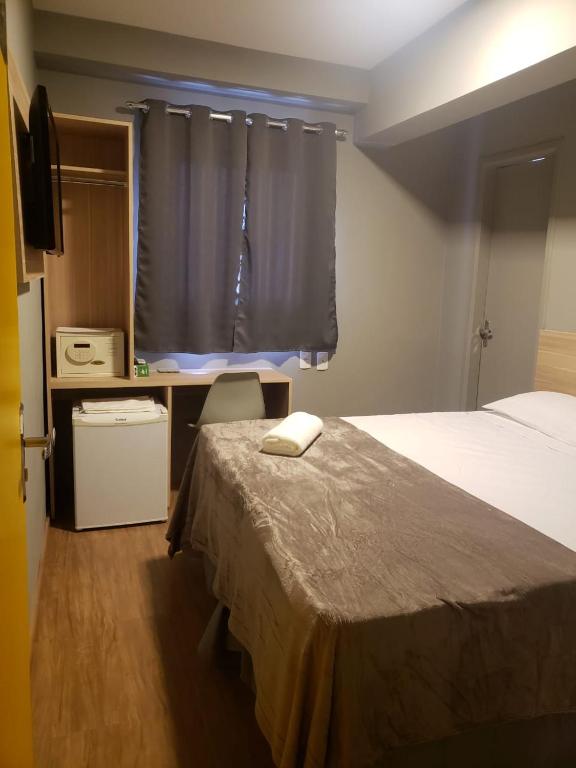 Letto o letti in una camera di Unity Hotel - Vila Mariana SP