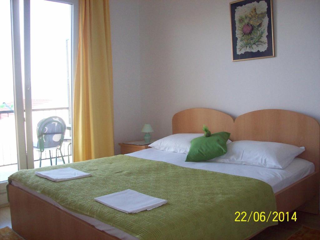 Posteľ alebo postele v izbe v ubytovaní Guesthouse Podaca