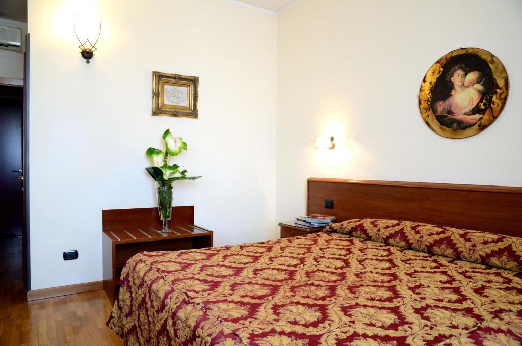 Łóżko lub łóżka w pokoju w obiekcie Hotel HDomus
