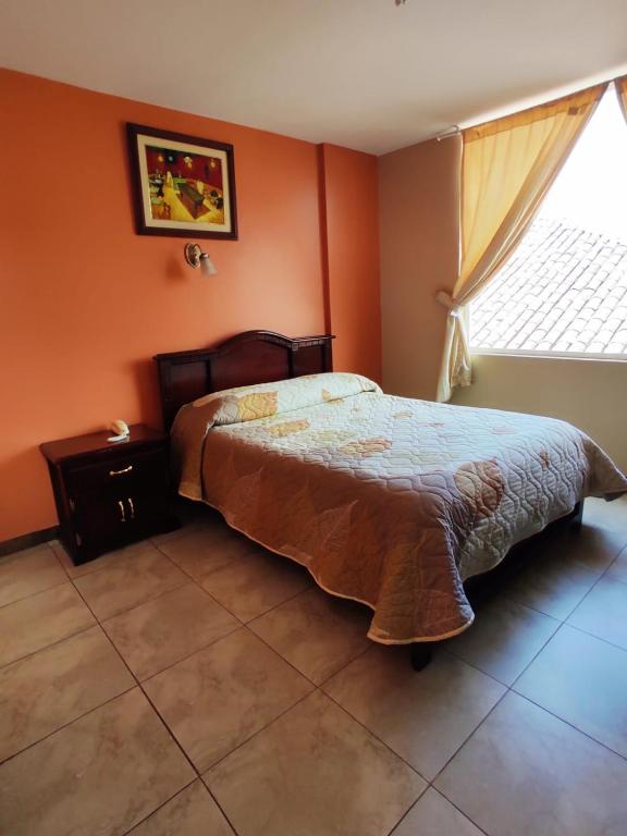Postel nebo postele na pokoji v ubytování Hostal EL CALLEJÓN