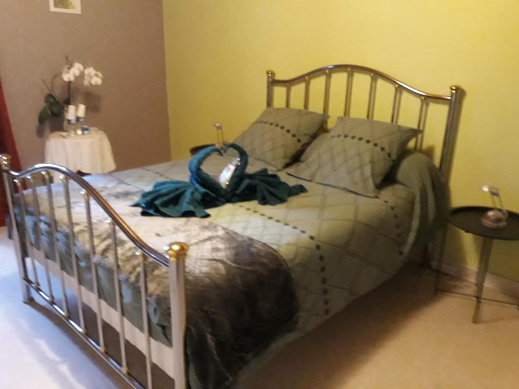 Postel nebo postele na pokoji v ubytování l orchidee