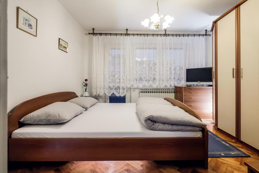 Postel nebo postele na pokoji v ubytování Sobe Pavica