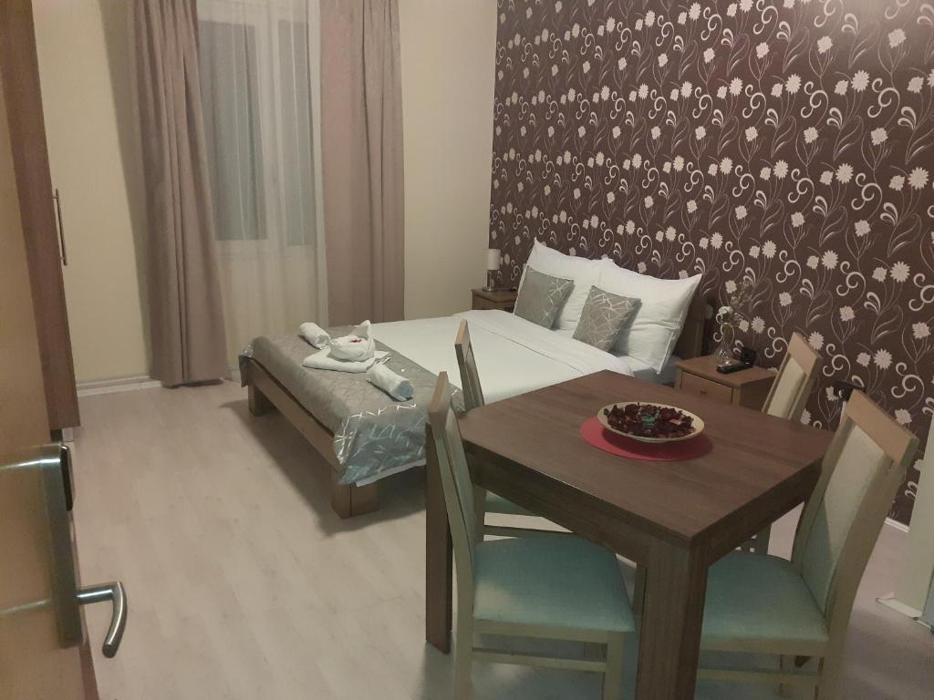 Postel nebo postele na pokoji v ubytování Apartmani CENTAR- Smederevo