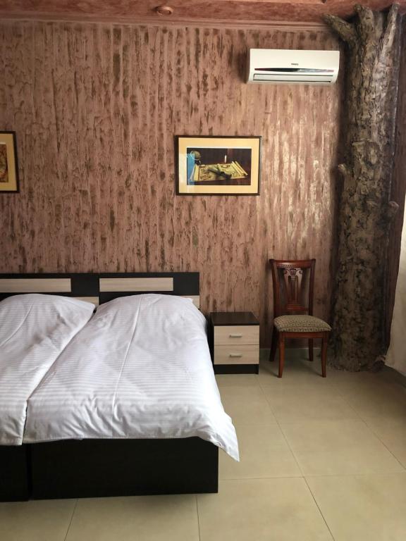 Postel nebo postele na pokoji v ubytování KangAr guest house