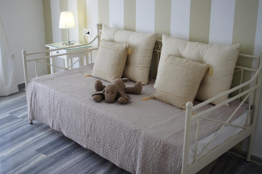 Postel nebo postele na pokoji v ubytování Hotel Cyclades