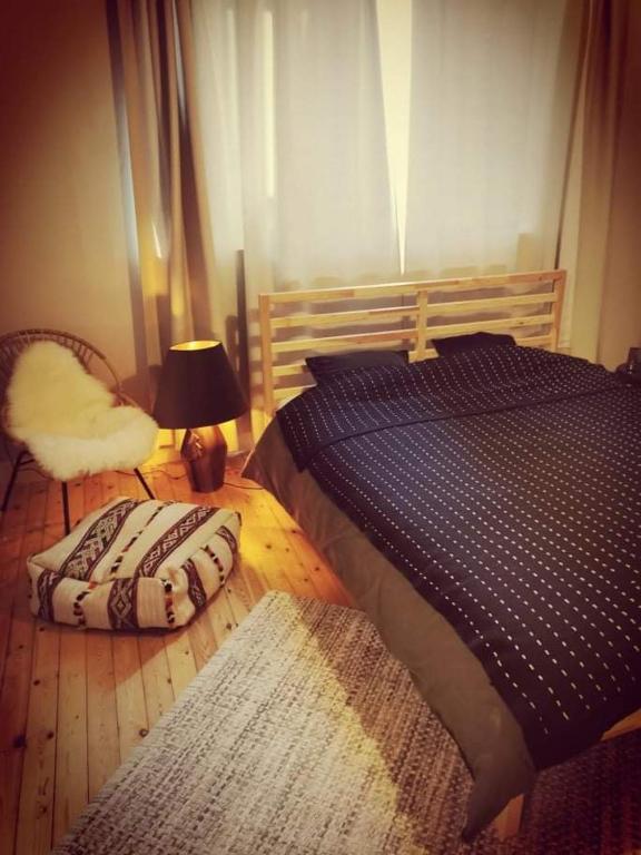 Postel nebo postele na pokoji v ubytování karaktervolle woning met zwembad te Ronse