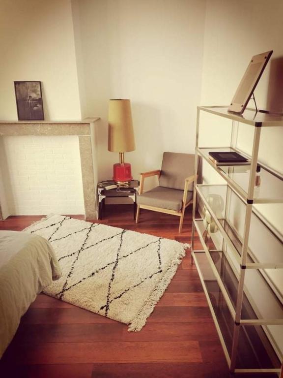 Postel nebo postele na pokoji v ubytování karaktervolle woning met zwembad te Ronse