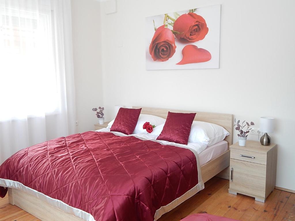 Postel nebo postele na pokoji v ubytování Bogácsa Apartman