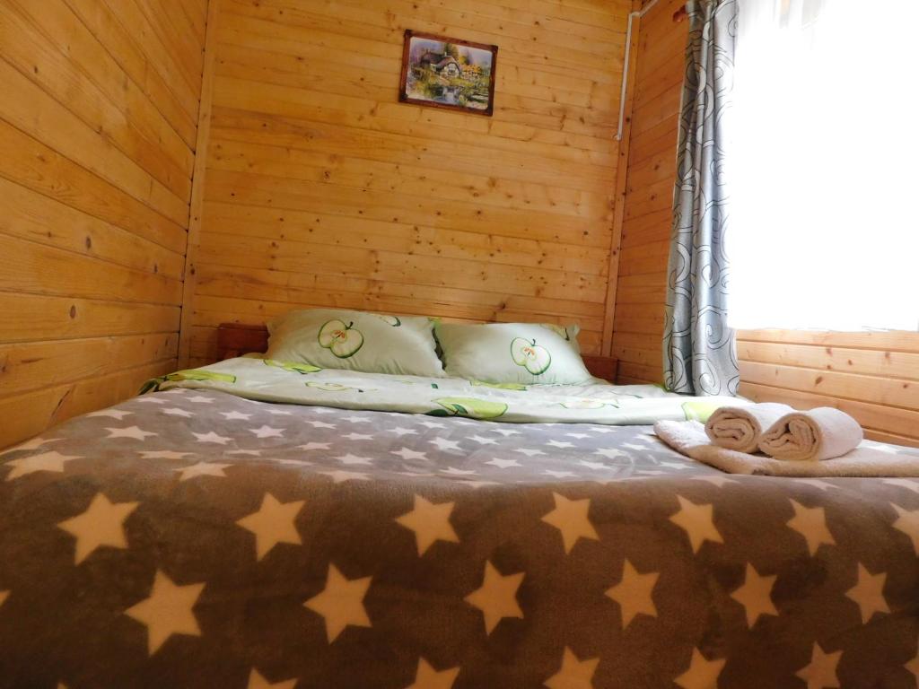 Postel nebo postele na pokoji v ubytování Sound of Nature Tismana