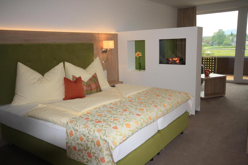 Postel nebo postele na pokoji v ubytování Hotel Aberseehof