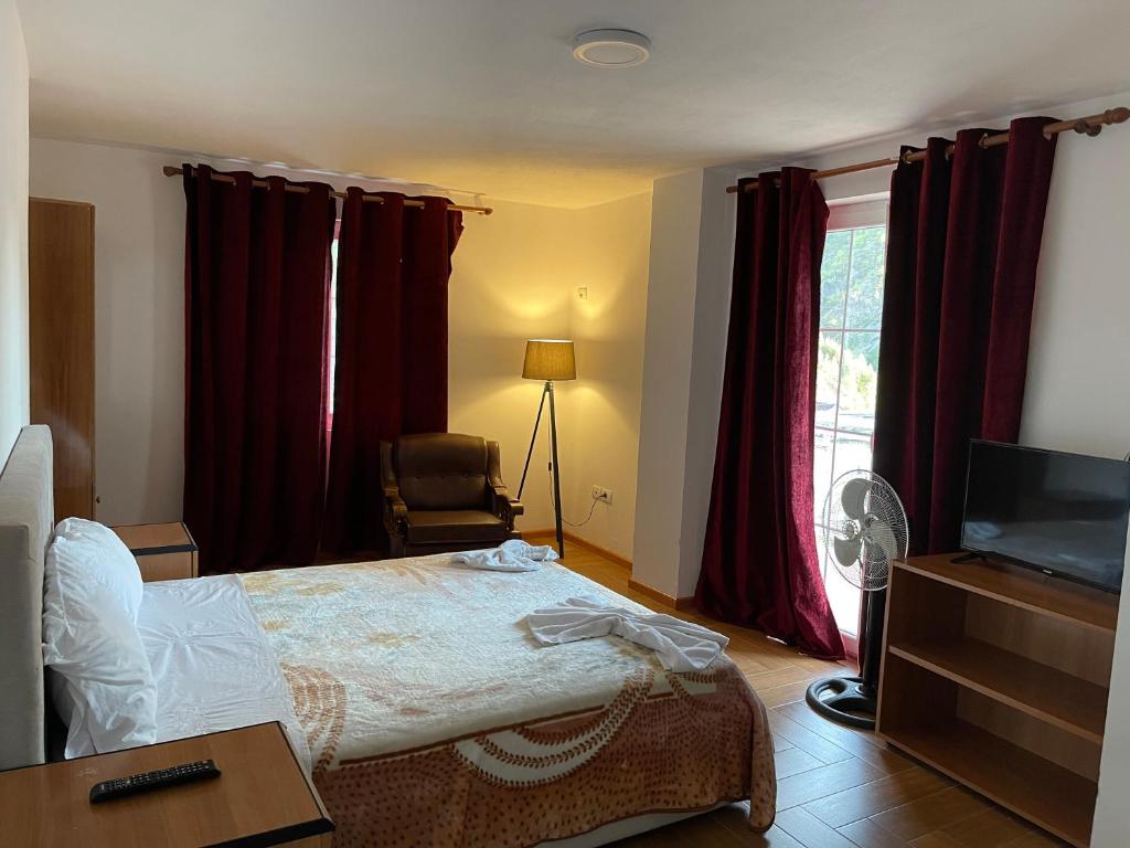 Postel nebo postele na pokoji v ubytování Hotel Internacional Gym & Spa Fushe-Arrez