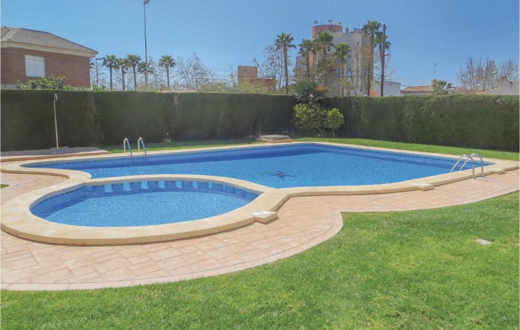 Bazén v ubytování Nice Apartment In Torrevieja With Wifi nebo v jeho okolí