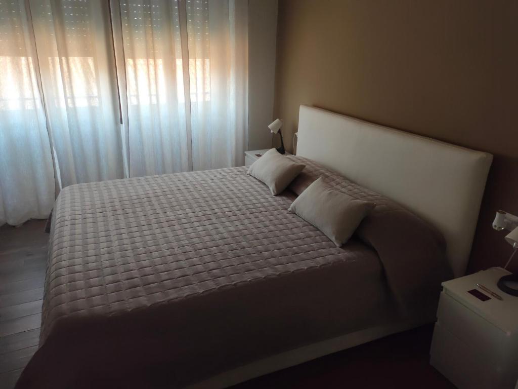 Postel nebo postele na pokoji v ubytování BnBFuoriMilano