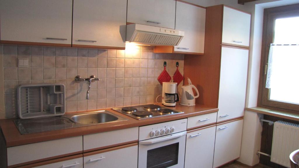Kuchyň nebo kuchyňský kout v ubytování Blasbichler Appartments