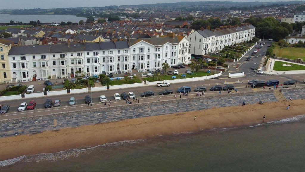 an aerial view of a beach and buildings at Best Western Exmouth Beach Hotel in Exmouth