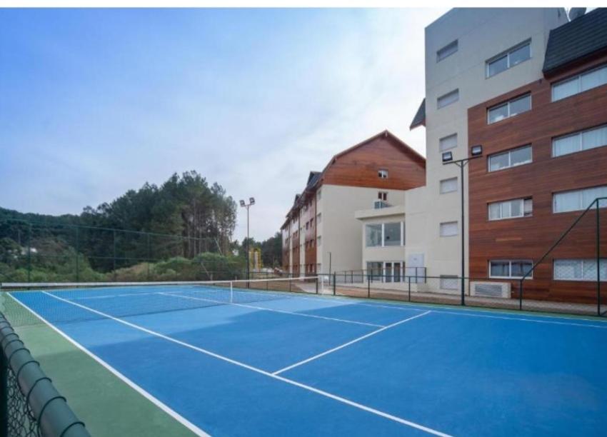 Tenis a/nebo squash v ubytování Laghetto Resort Golden Gramado nebo okolí