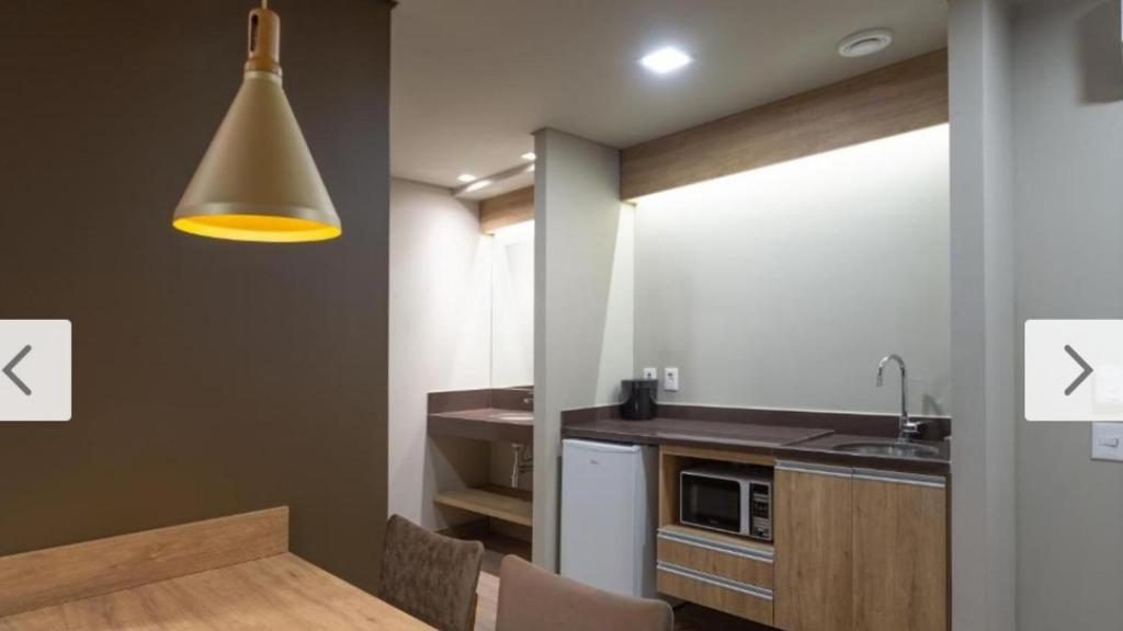 Kuchyň nebo kuchyňský kout v ubytování Laghetto Resort Golden Gramado