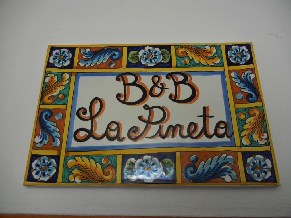 レッジョ・ディ・カラブリアにあるB&B La Pinetaのジャマイカ屋の看板