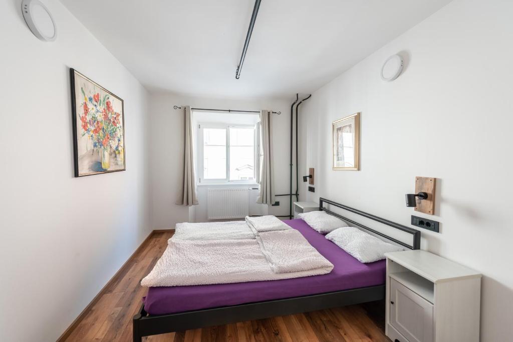 Postel nebo postele na pokoji v ubytování AdHoc Hostel